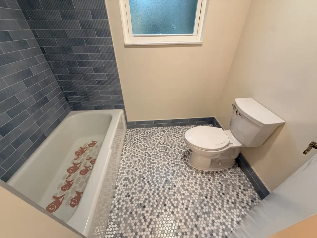 Pebble mosaic bathroom floor