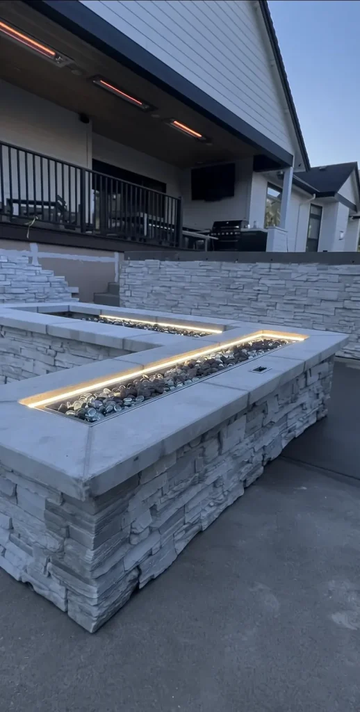 Custom stone veneer outdoor seating wall