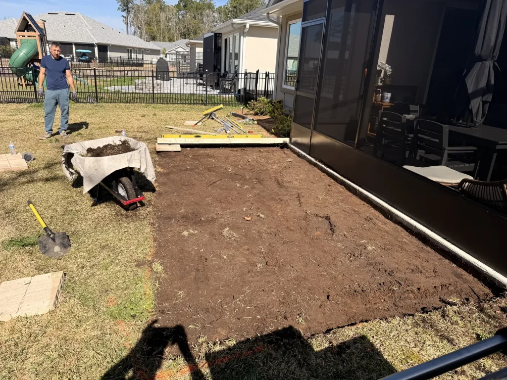 Before: bare yard ready for patio